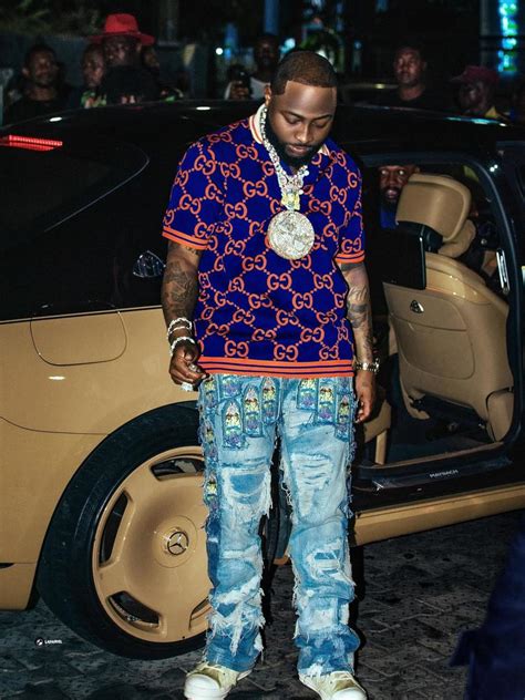 davido wears gucci sneakers|Davido Outfits .